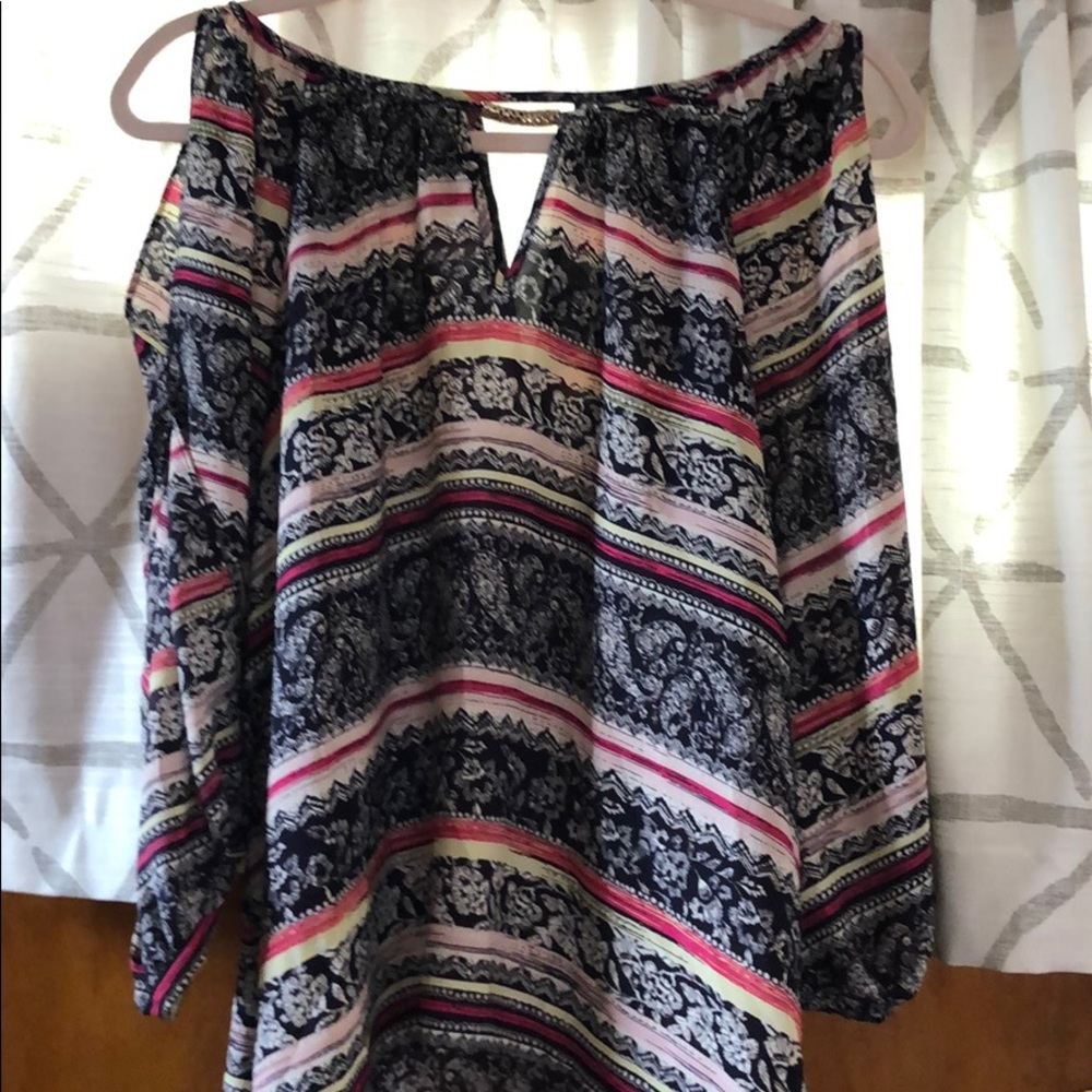 Peek -a -boo sleeve ladies blouse